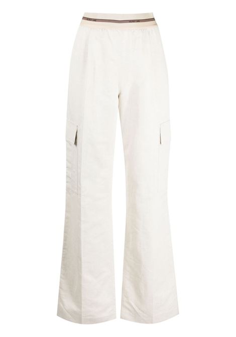 Pantaloni cargo con banda logo in bianco - donna